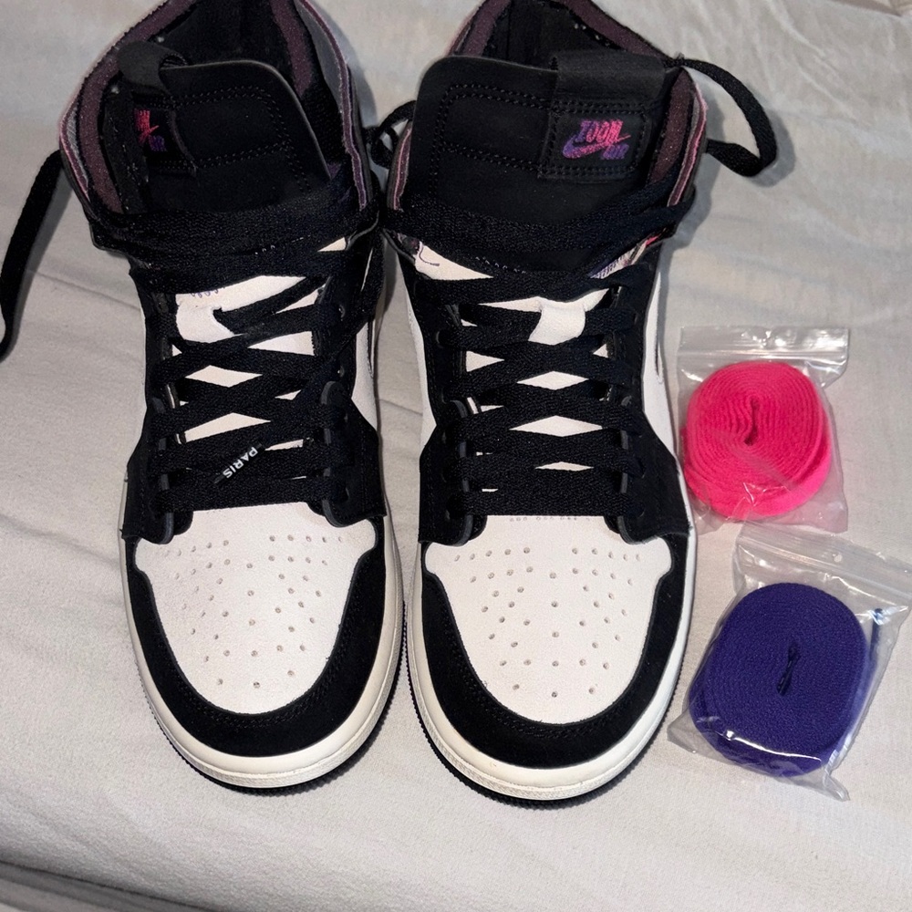 Nike Black and White High-Top Sneakers with Pink Accents